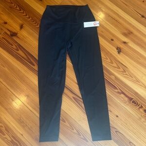 Manduka Evolve black legging size large new with tags